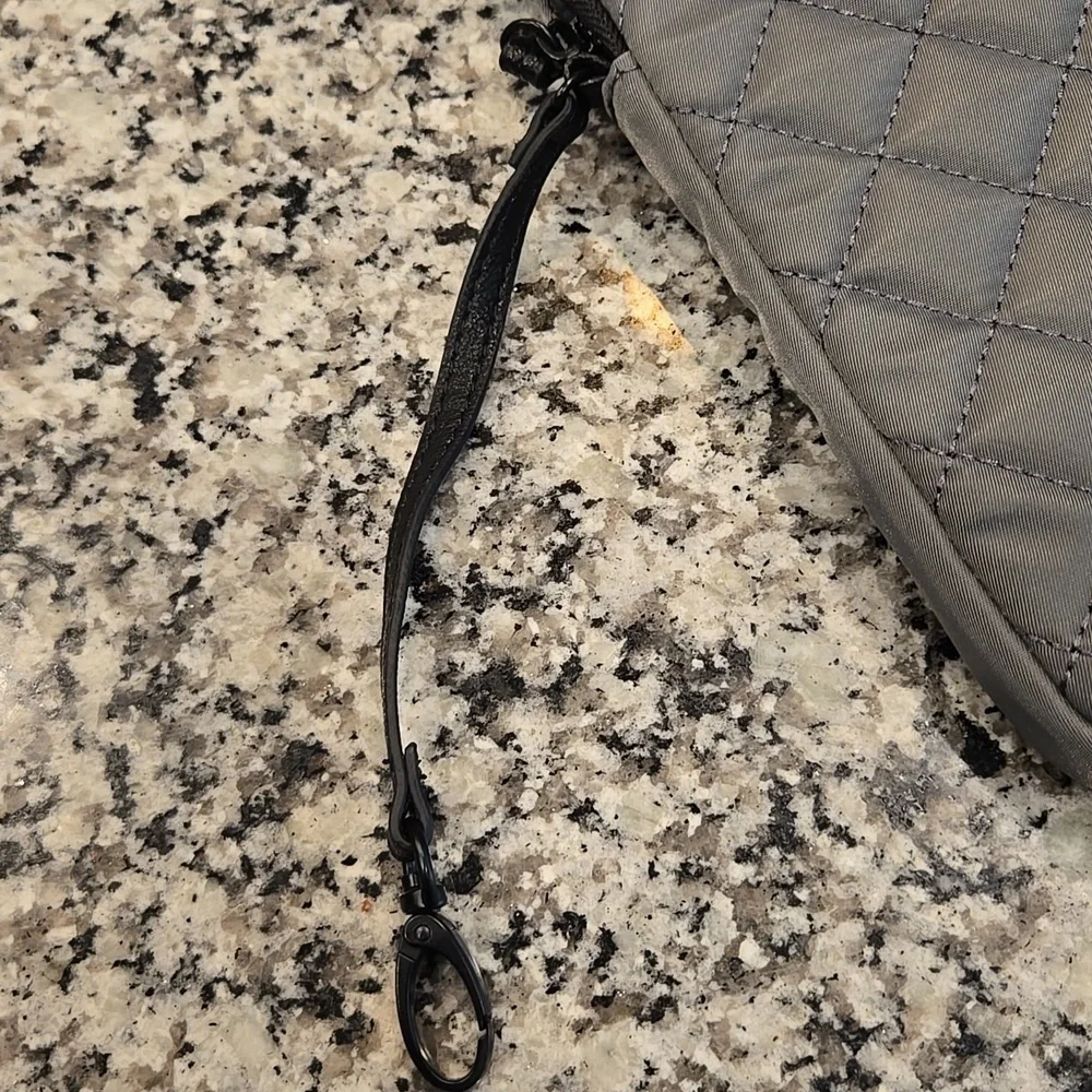 STEVE MADDEN BACKPACK WITH INCLUDED FRONT QUILTED POUCH FOR A TABLET. BLUE/GREY.